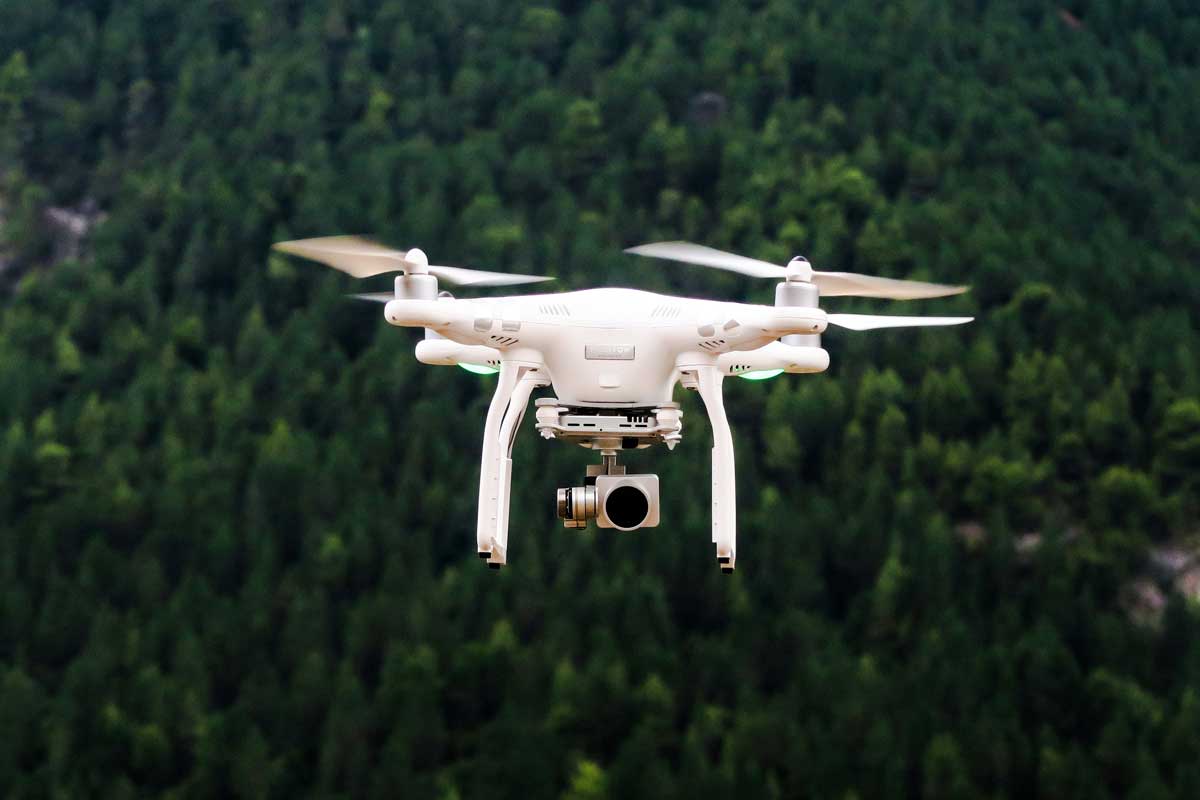 Photo of aerial drone over forest